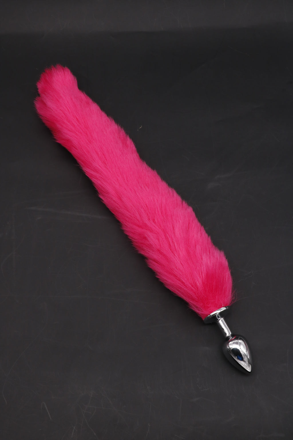 E-12, E-13, E-11 fox tail plug with grey, pink, and black colors, featuring a realistic fox tail attachment.