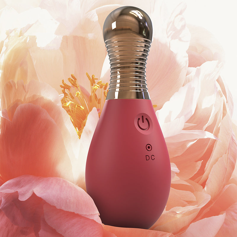 E-41 PerfumeWhisper Nimi Mini Remote Bullet Vibrator in sleek compact design, shown in close-up with textured surface.