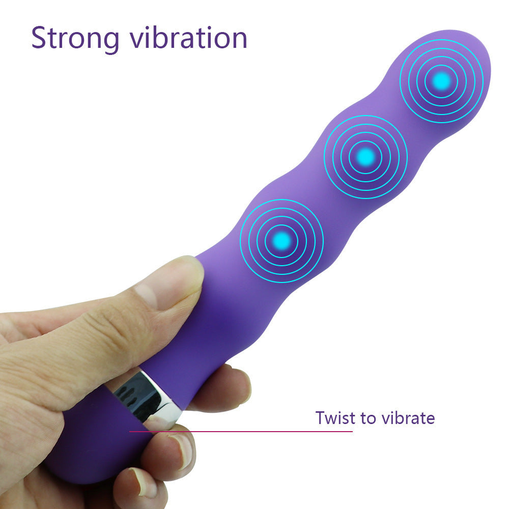 E-27 FlexiGlow vibrator with flexible design and smooth surface, shown on a neutral background.