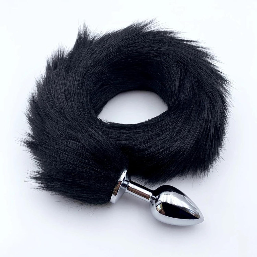 Silicone fox tail plug in grey, pink, and black with a realistic fox tail attached, designed for adult anal play.