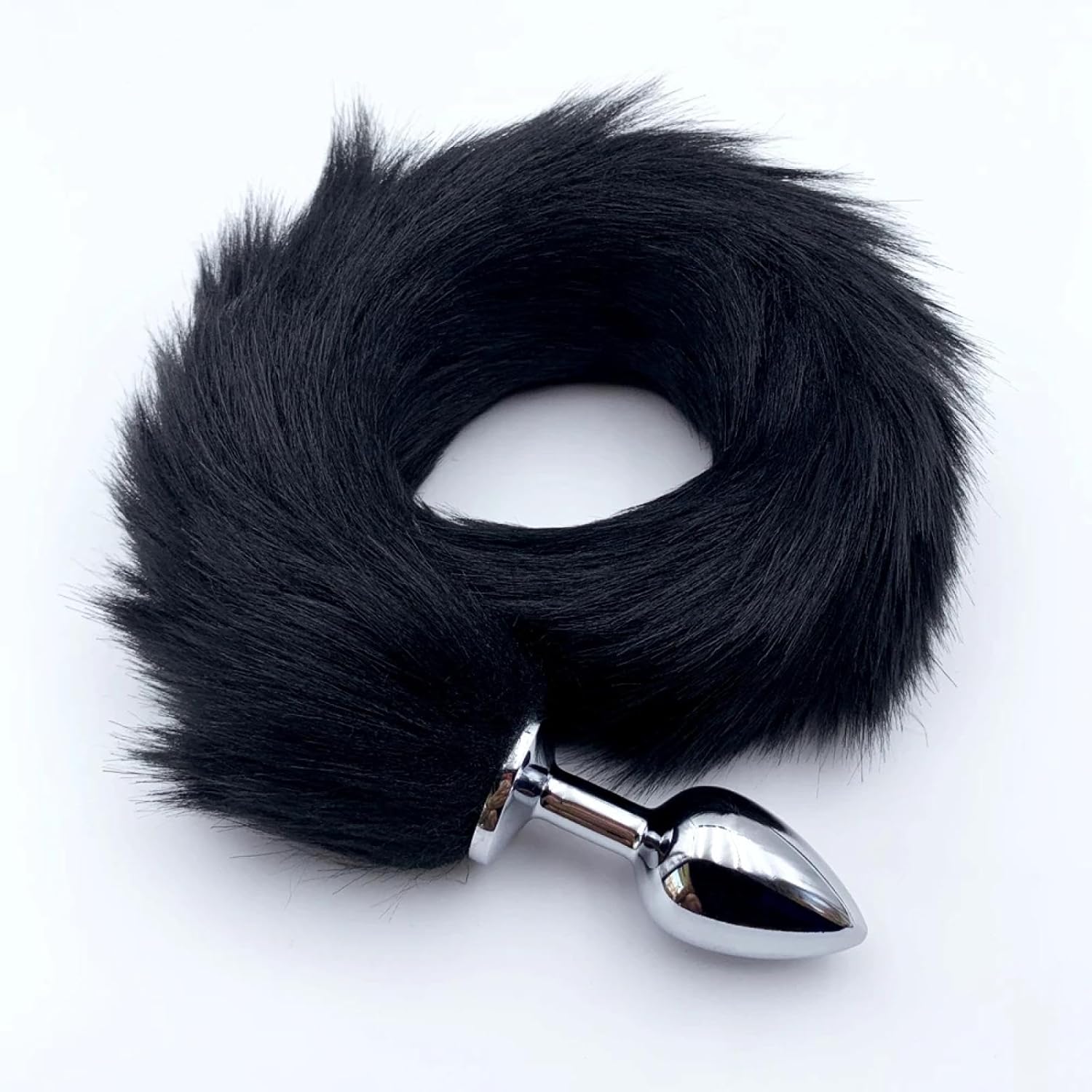 Silicone fox tail plug in grey, pink, and black with a realistic fox tail attached, designed for adult anal play.