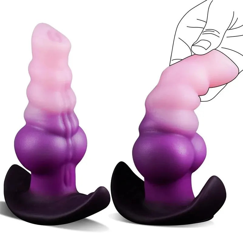 C-36 Flexibler Dämon anal plug with relief and suction cup base, featuring a large knot for comfortable wear and added stimulation.