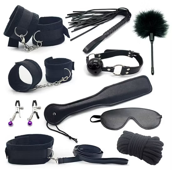 Couple wearing black leather BDSM bondage set with restraints and harnesses for adult BDSM play by D-21.