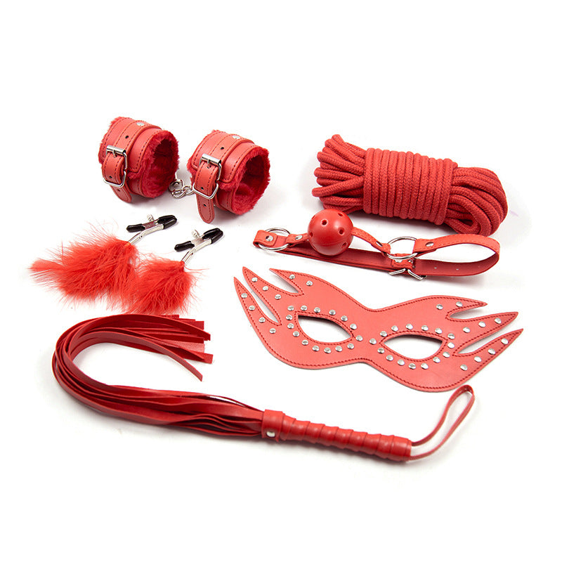 Black BDSM leather bondage set with straps, cuffs, and collar from Dominus Noir by D-21, B-12 for adult restraint play.