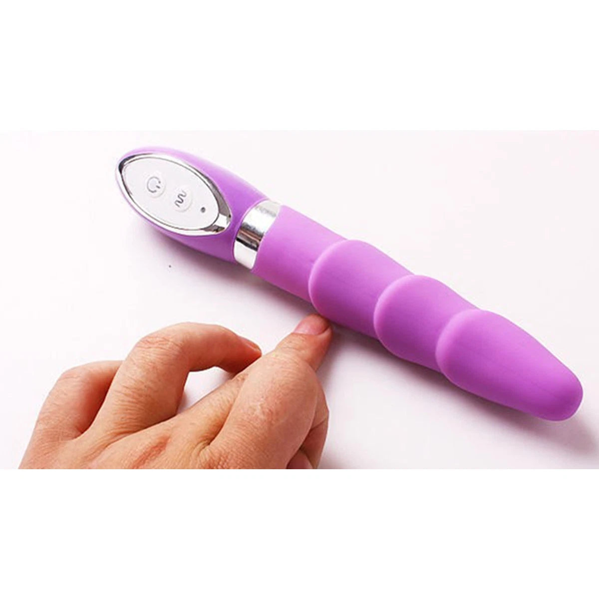 D-36 VelvetRipple wavy silicone vibrator with textured surface, designed for pleasurable stimulation and ergonomic use.